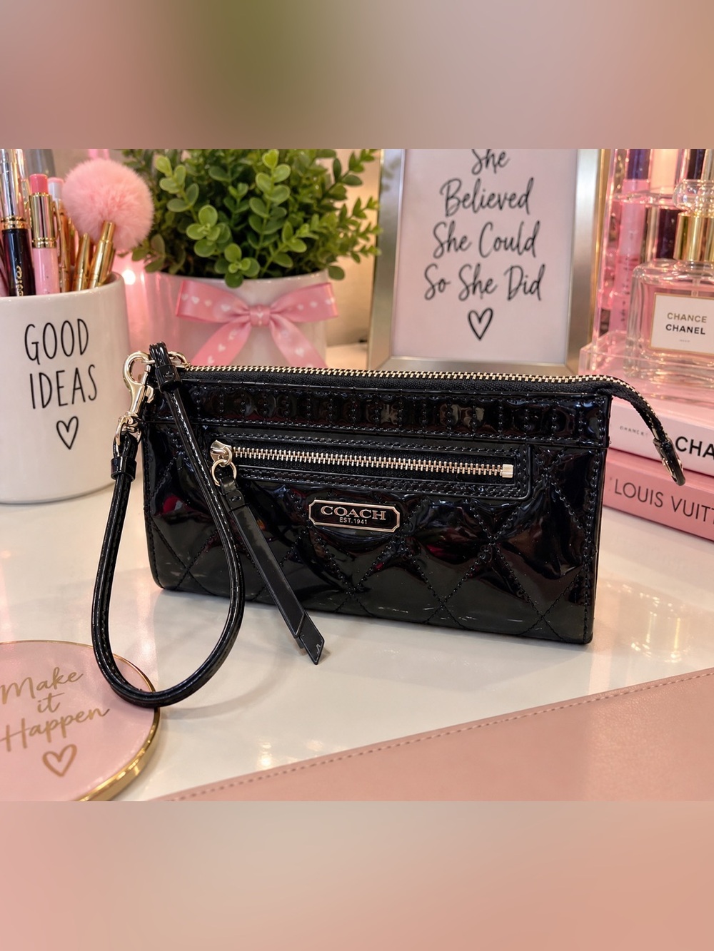 Coach Poppy Black quilted patent leather wristlet wallet.